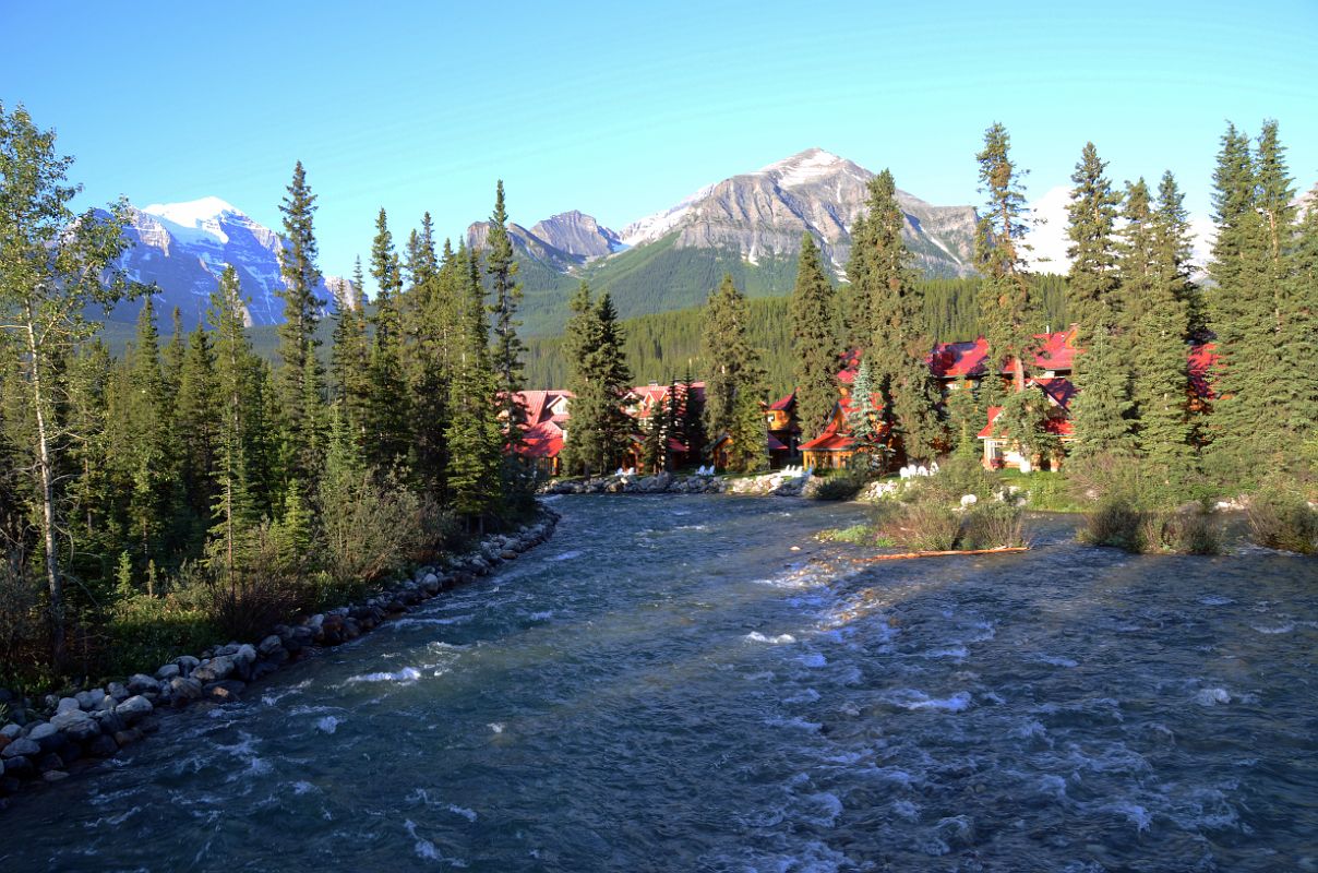 03 River Flowing Through Lake Louise Village With Mount Temple, Sheol Mountain and Fairview Mountain Beyond Early Morning From Lake Louise Village